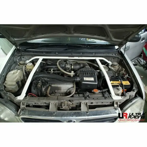 Daihatsu Cuore 99-04 Ultraracing 4-Point Front Upper Bar 018 1